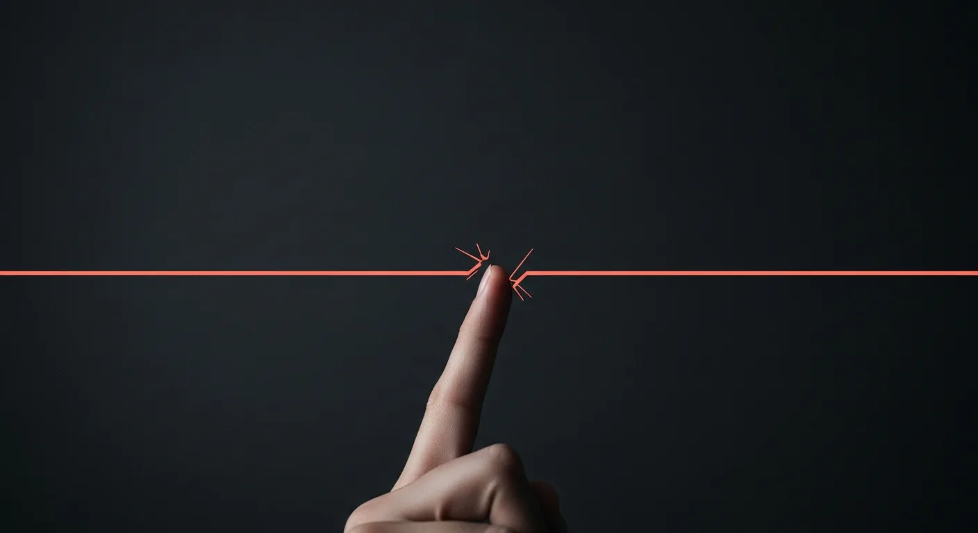 A fingertip tapping through a small break in a thin coral line on a dark background.